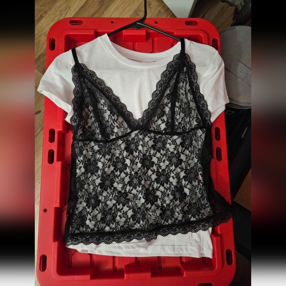 White shirt with black lace over top size medium in women's